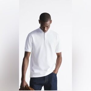 ZARA BAND COLLAR SHIRT WITH FRONT BUTTON CLOSURE AND SHORT SLEEVES.